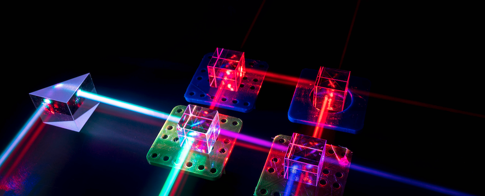 Laser beams in a laboratory for optical physics. Credit: Shutterstock.